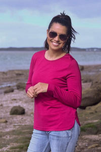 EBONY_WOMENS 100% MERINO WOOL (210) CURVE HEM LONG SLEEVE TOP RASPBERRY _ _ Ebony Boutique NZ