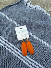 DUNE ROAD_OVAL COLOURED WOOD PENDANT EARRINGS ORANGE _ OVAL COLOURED WOOD PENDANT EARRINGS ORANGE _ Ebony Boutique NZ