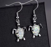 DUNE ROAD_TURTLE EARRINGS IMITATION OPAL WHITE _ TURTLE EARRINGS IMITATION OPAL WHITE _ Ebony Boutique NZ