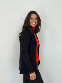 EBONY_WOMENS MERINO JACKET 100% WOOLLEN CURVED PANELS LONG SLEEVES BLACK _ WOMENS MERINO JACKET 100% WOOLLEN CURVED PANELS LONG SLEEVES BLACK _ Ebony Boutique NZ
