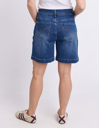 IZZY DENIM SHORT MID BLUE WASH_by_ELM_women's_in_New Zealand_ BACK _