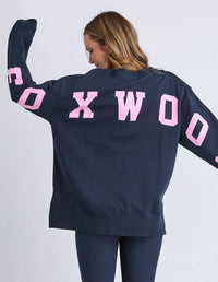 INTERVAL CREW PINK/NAVY_by_FOXWOOD_women's_in_New Zealand_ FOXWOOD Interval Crew Pink Navy women’s sweatshirt back view highlighting oversized graphic print across back and sleeves _