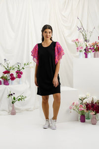 HOME LEE_LOLA DRESS BLACK WITH SUNSET FLORAL SLEEVES _ LOLA DRESS BLACK WITH SUNSET FLORAL SLEEVES _ Ebony Boutique NZ