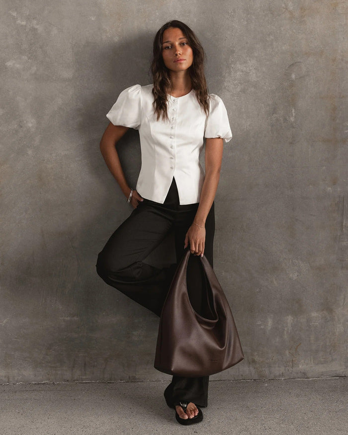 MONACO SHOULDER BAG CHOCOLATE_by_LOUENHIDE_women's_in_New Zealand_ Louenhide Monaco Shoulder Bag styled on model for work, lunch or casual outings in New Zealand showing oversized relaxed fit _