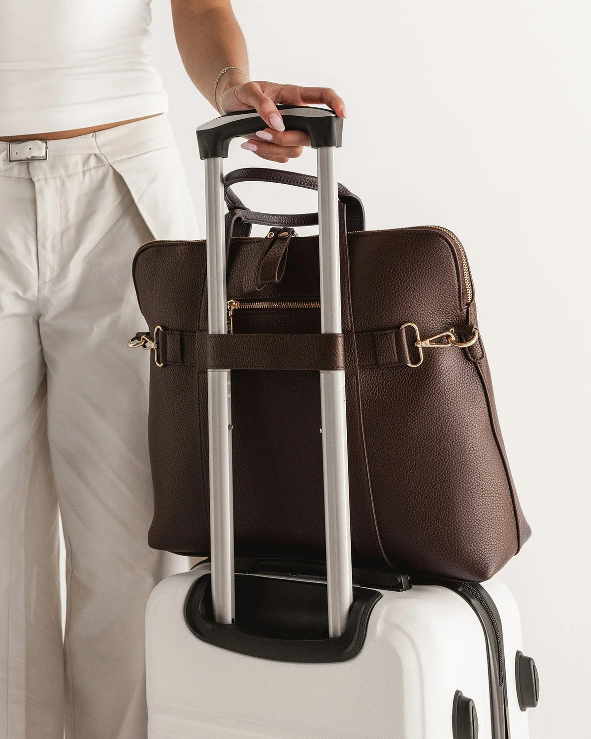 RHODES LAPTOP BAG CHOCOLATE_by_LOUENHIDE_women's_in_New Zealand_ Louenhide Rhodes Chocolate women’s laptop bag styled on luggage for travel - ready work bag in New Zealand _