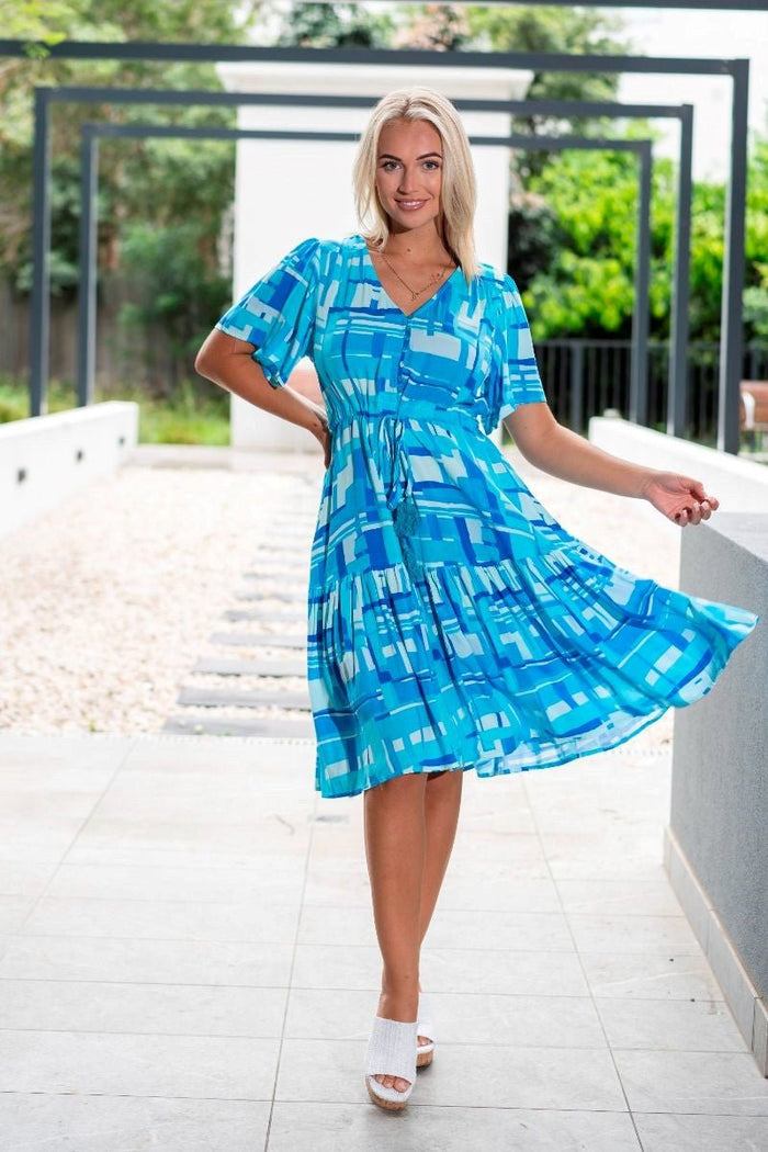 WILLOW TREE_ABSTRACT PRINT FLUTE SLEEVE TIERED DRESS _ ABSTRACT PRINT FLUTE SLEEVE TIERED DRESS _ Ebony Boutique NZ